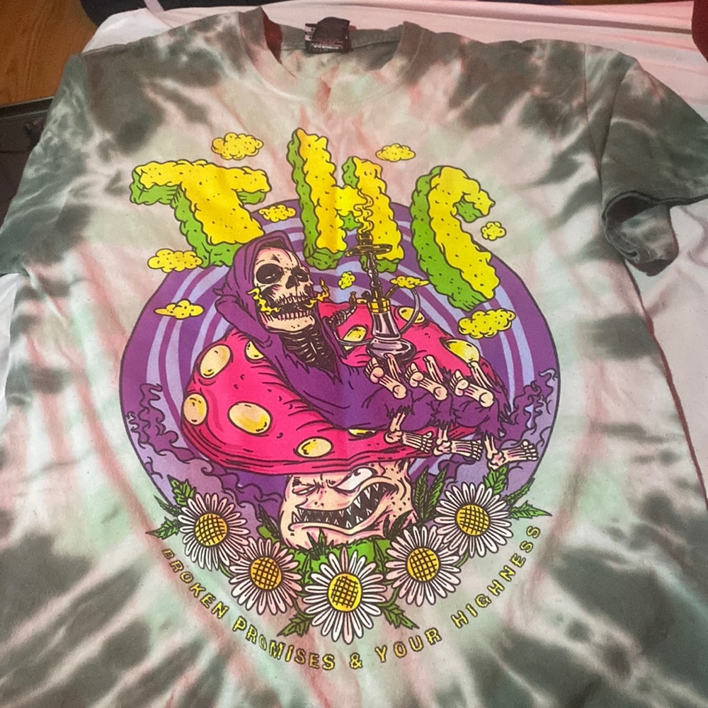 This is a Broken Promises shirt from the store zumiez.